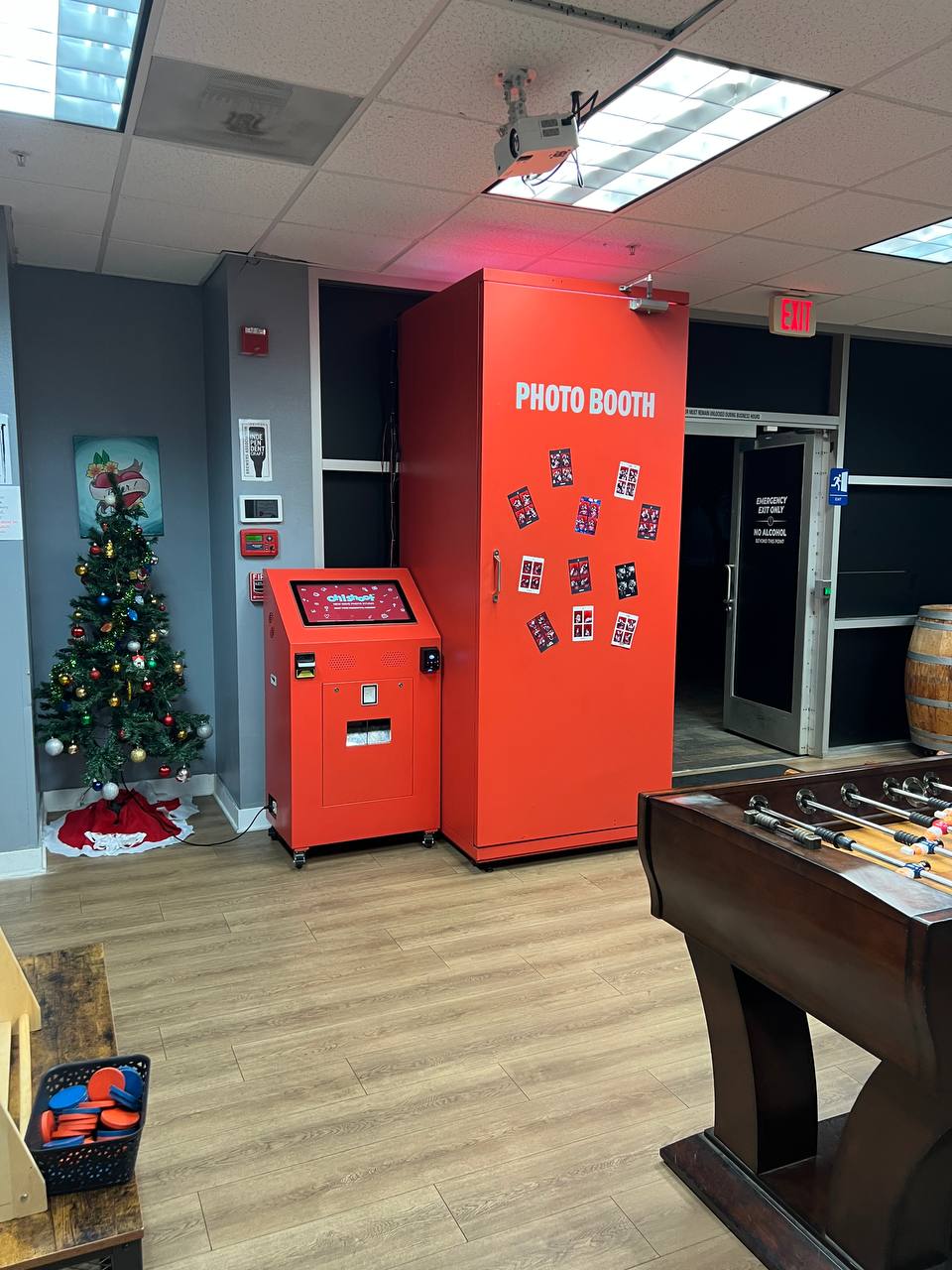 oh!Shoot photo booth installed beside games in a venue